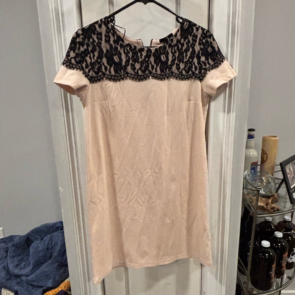 H&M pink dress with black lace detail. Size small good shape